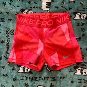 Nike Pro Women's Pink and Red Patterned Athletic Shorts